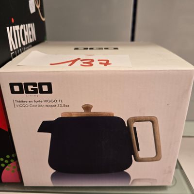 a box that has a tea pot in it