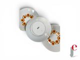 a white plate with a yellow flower design on it and a white plate with a yellow flower design on it