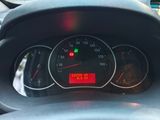 a close up of a car dashboard with a speedometer