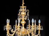 a brass and crystal chandelier with five lights