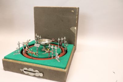 a box with a bunch of figurines inside of it