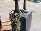 a machine that is sitting on top of a pallet