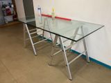 a glass table with a ladder on it in a room