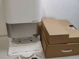two boxes and a box with a speaker on it