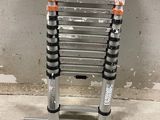 a close up of a ladder on a concrete floor in a room