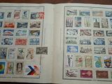 a book with stamps on it sitting on a table