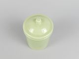 underside view of a green cup showing the lid