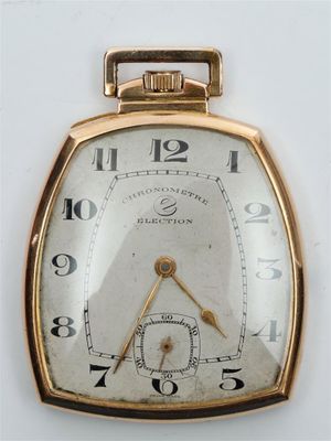 une image représentant une montre de poche plaquée or avec des chiffres romains