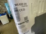 a white box with a label on it sitting in a warehouse