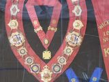 a picture of a display of a variety of sashes