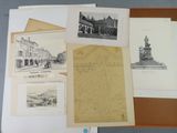 some of the drawings and drawings are on display on the table