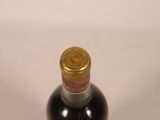 a bottle of wine that is sitting on a table