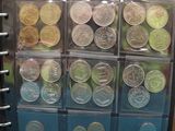 a picture of a book with a bunch of coins in it