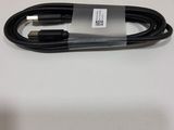 a close up of a cable connected to a charger on a table