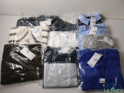 a lot of men ' s shirts that are wrapped in plastic