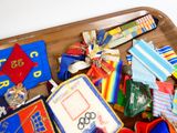 a wooden tray with many different items on it