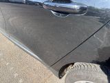 a close up of a car door handle with a hole in it