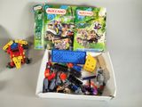 a box full of legos and a toy robot