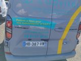a van that is parked on the side of the road