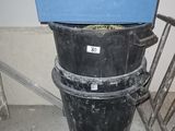 a stack of black and blue containers sitting on top of each other