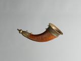 une pipe posée sur une table