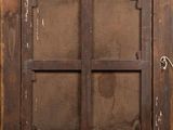 an old window that has a handle on it