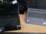 many laptops that are sitting on a table
