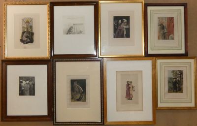 many framed pictures hanging on the wall of a room