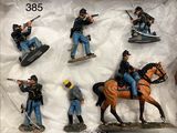 six figurines of a man on a horse and a man on a horse