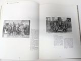 a book opened to show a picture of a group of soldiers