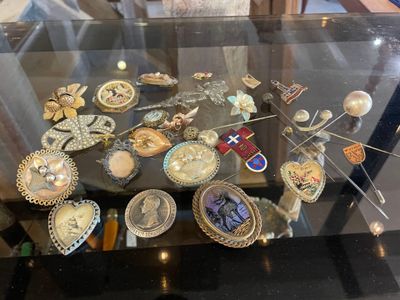 a glass table with a lot of different items on it