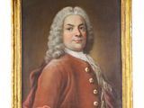 portrait d'un homme vêtu d'un manteau rouge, dans un cadre doré