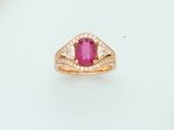 an image of a ring with a ruby stone and diamond accents