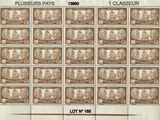 un timbre sur lequel figure l'image d'un groupe de personnes