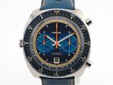 un gros plan d'une montre au cadran bleu