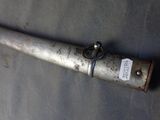 an old baseball bat with a tag on it