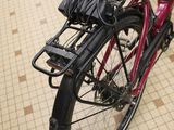 a bicycle that is parked on the floor in a room
