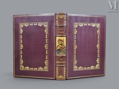 an old book with a picture of a woman on the cover