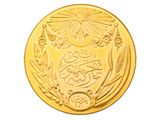 l'image d'une pièce d'or sur laquelle figurent des armoiries