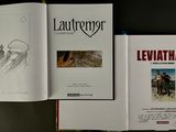 three books that are sitting on a table