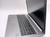 a laptop that is sitting on a white table