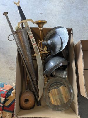 a cardboard box with a bunch of items inside of it