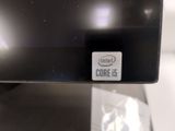 an image of a close up of a computer monitor on a table