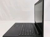 the back of a laptop computer sitting on top of a white table