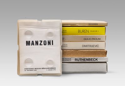 several boxes of cigarettes are stacked on top of each other