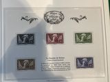 a picture of a picture of some stamps on a table