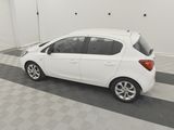 a picture of a white car parked in a garage