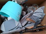 a cardboard box filled with many different items and items