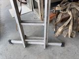 a picture of a ladder that is leaning against a wall