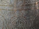a large metal pot that is sitting on a table